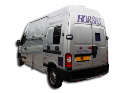 horsebox with side loading spring loaded ramp